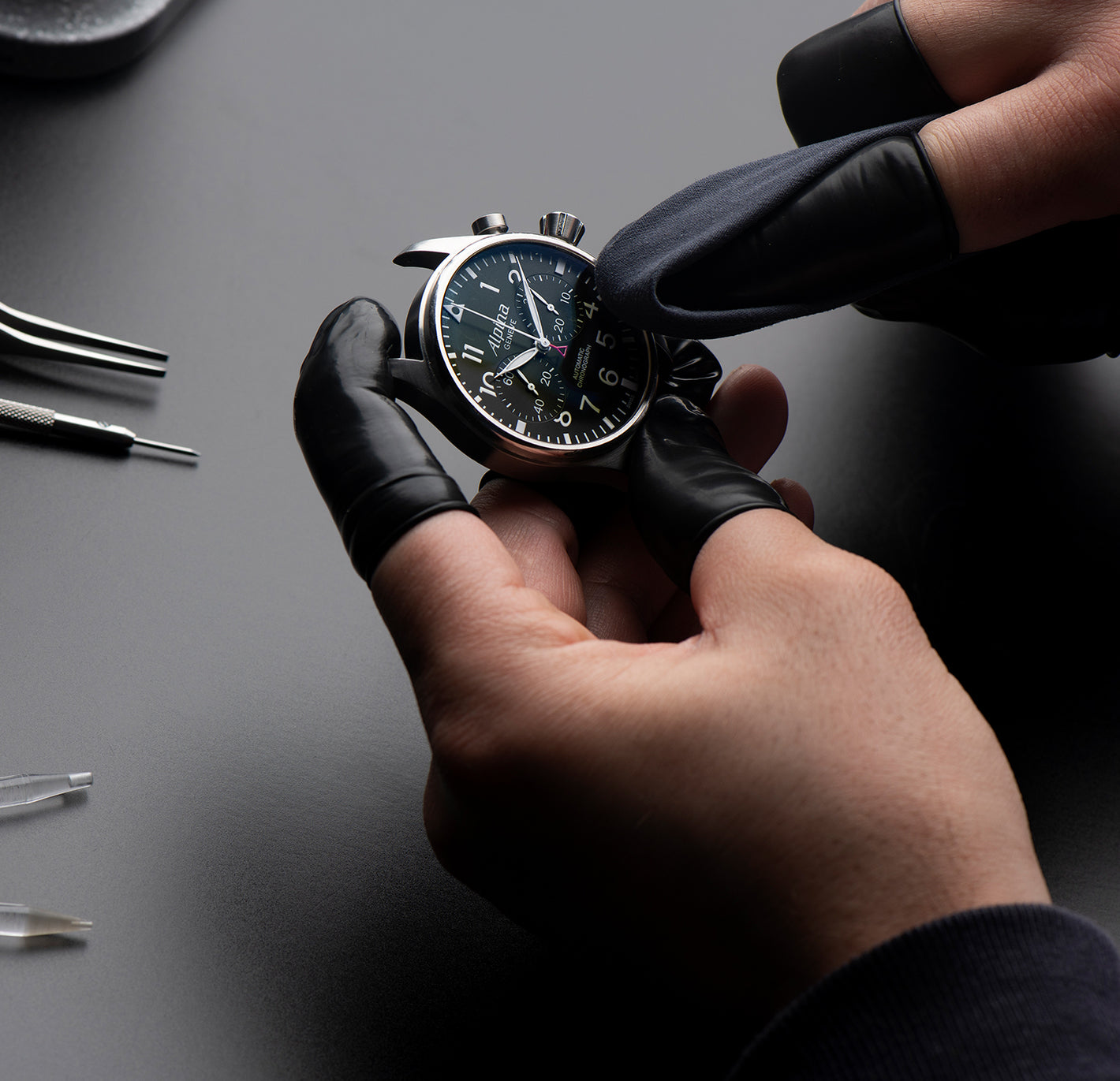 Alpina watch being made, polished by Swiss watchmaker